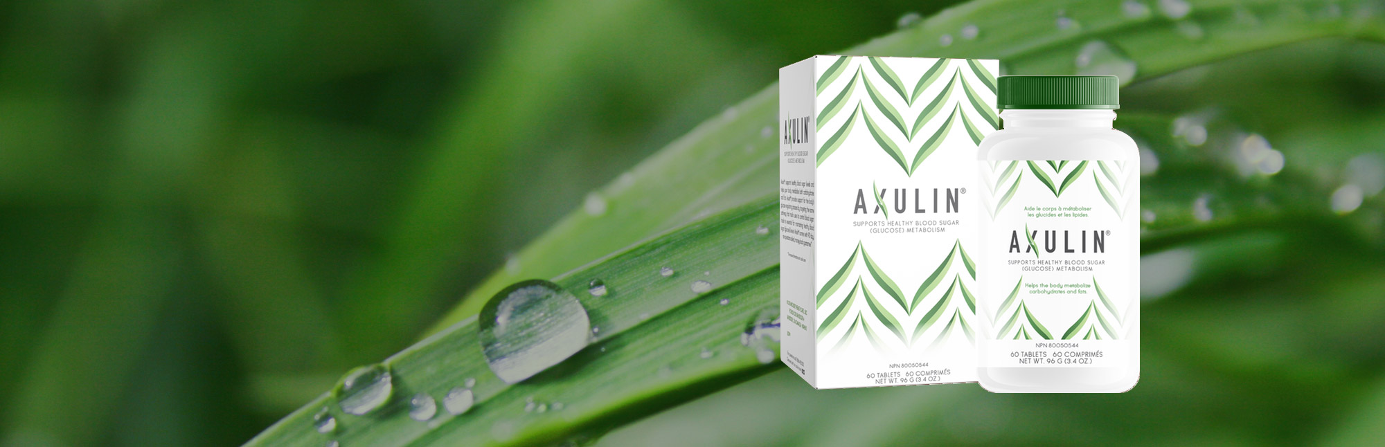 Axulin box and bottle with close-up of green leaf as background